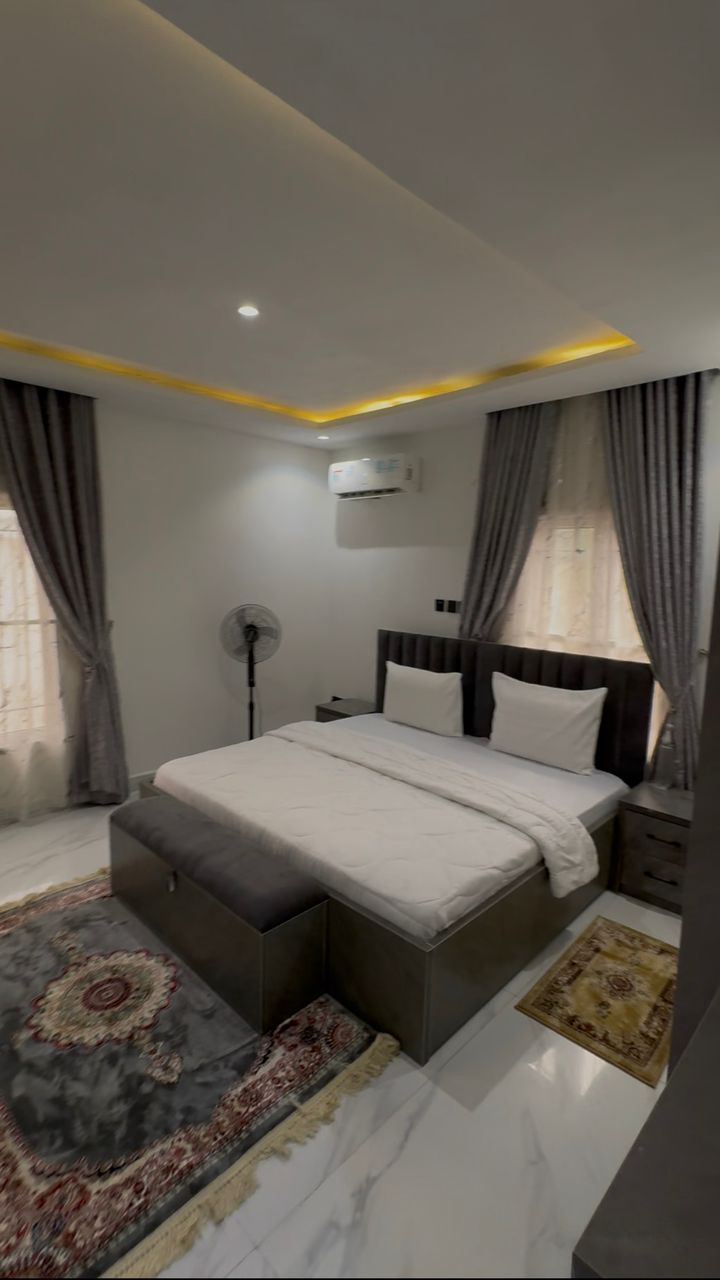 Premium bedroom suite with soft ambient lighting