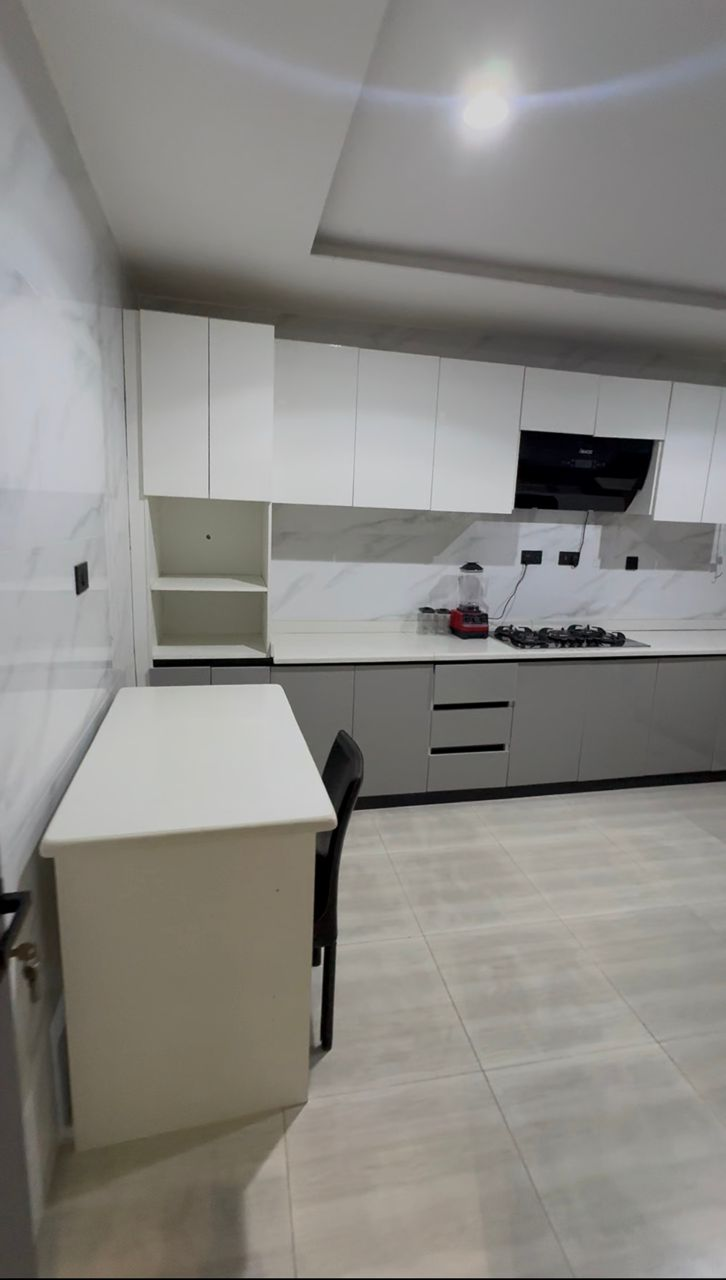 Modern fitted kitchen at Royalgate Apartment